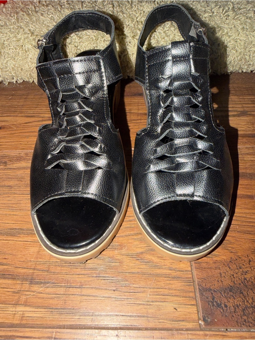 Woman’s Black Open-Toe Leather Sandals